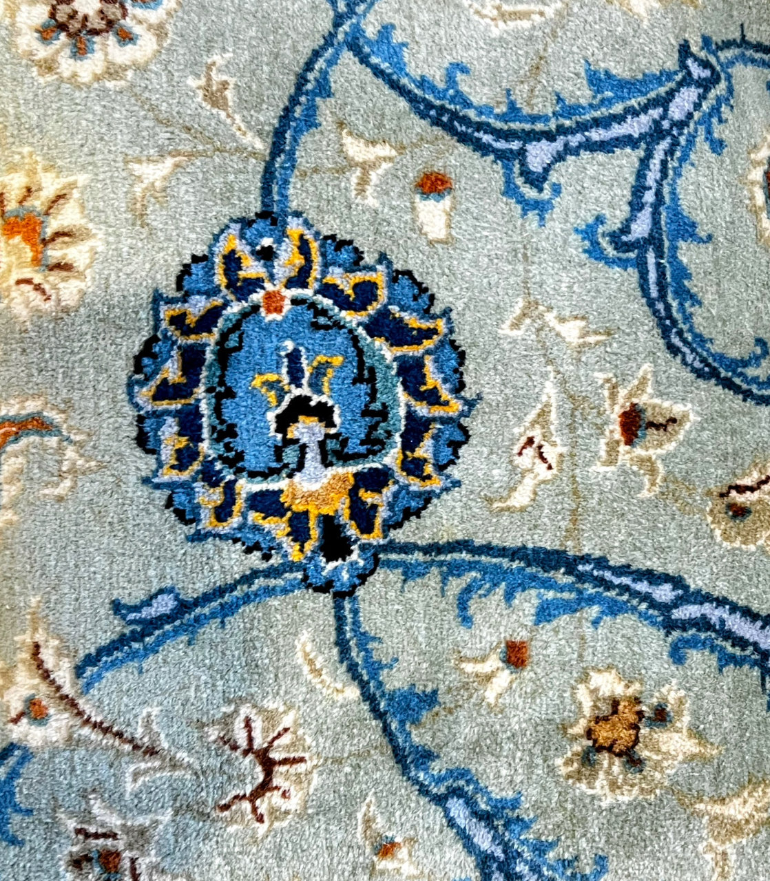 Image of a carpet fragment repurposed as a cushion